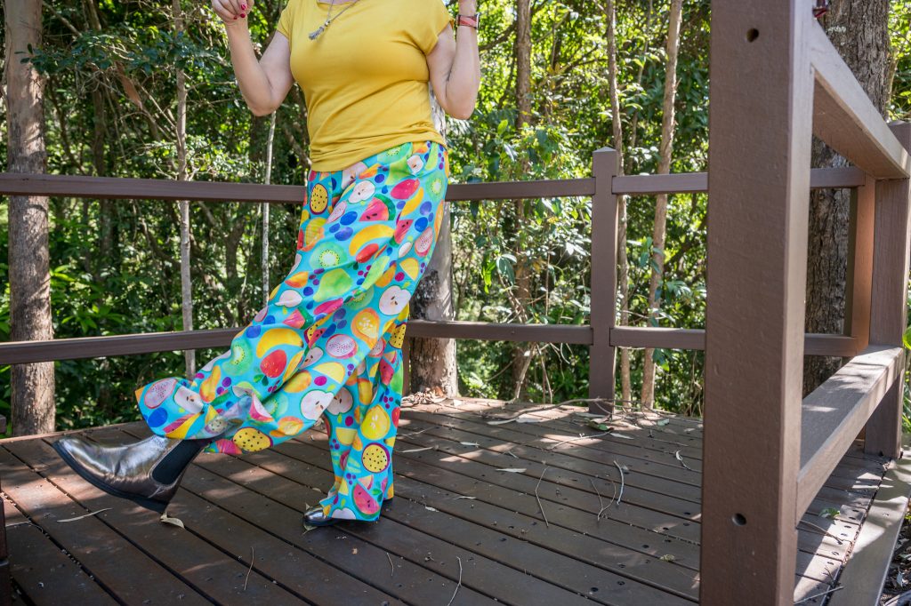 photo of Mags kicking while wearing flowing pants